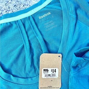 New with tags Reebok Women's Turquoise Top